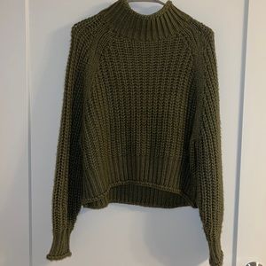 Two knitted turtleneck sweaters